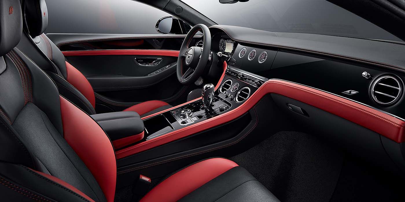 Bentley Leicester Bentley Continental GT S coupe front interior in Beluga black and Hotspur red hide with high gloss Carbon Fibre veneer