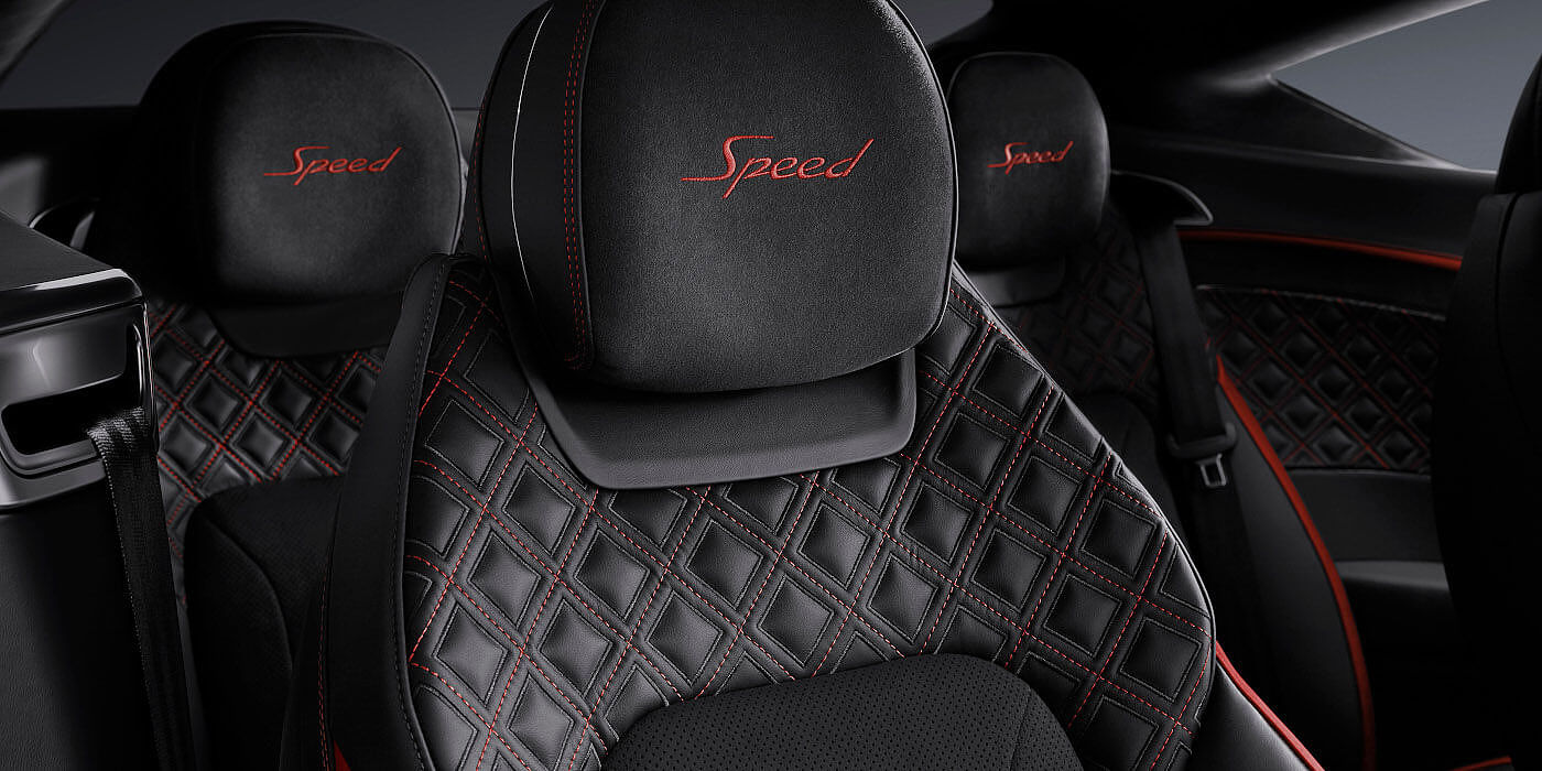 Bentley Leicester Bentley Continental GT Speed coupe seat close up in Beluga black and Hotspur red hide