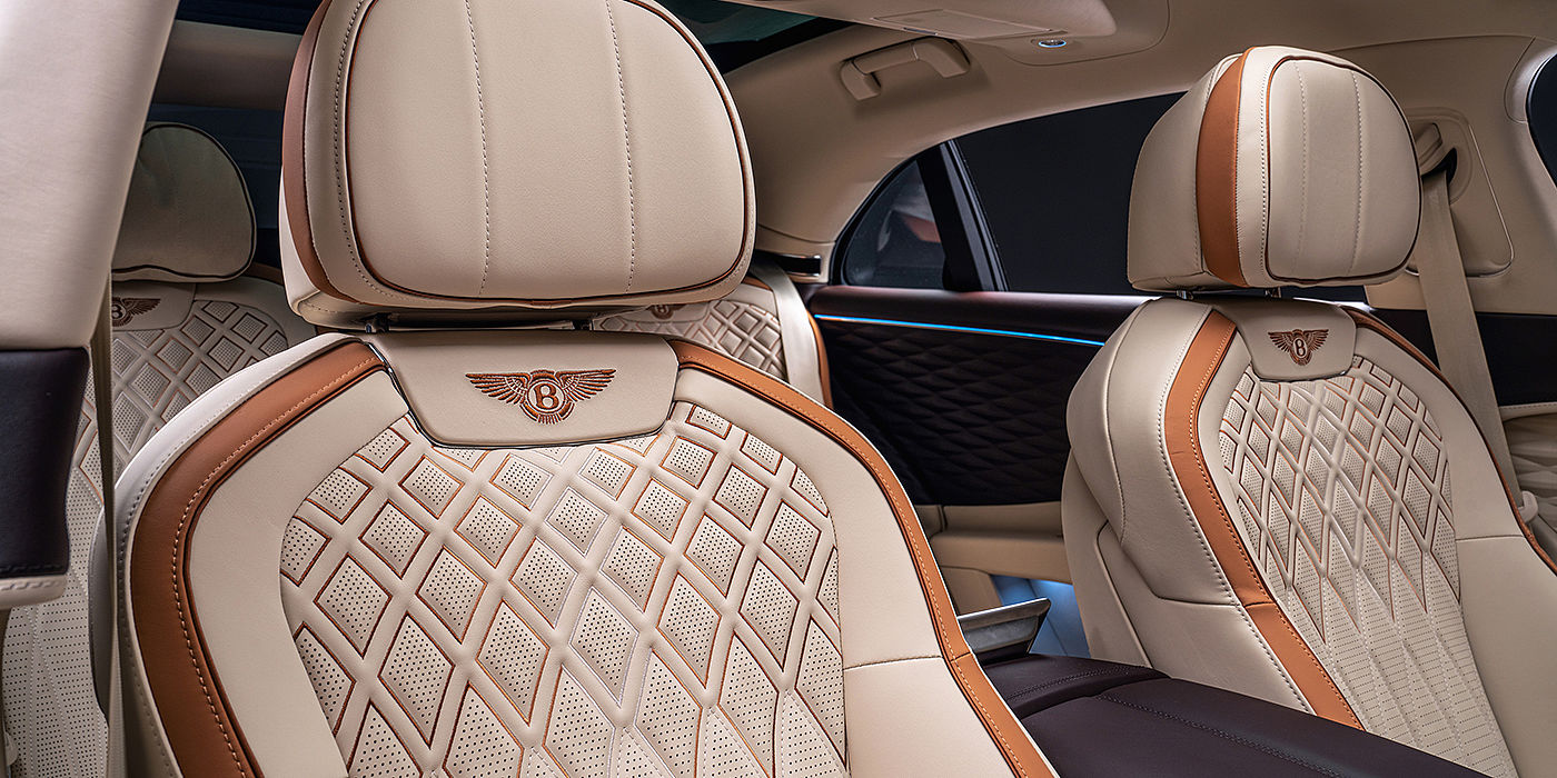 Bentley Leicester Bentley Flying Spur Odyssean sedan rear seat detail with Diamond quilting and Linen and Burnt Oak hides