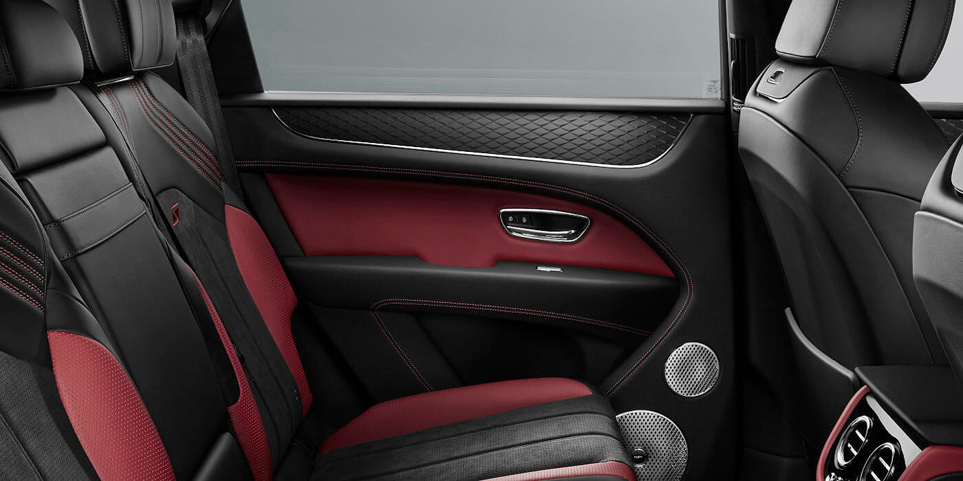 Bentley Leicester Bentley Bentayga S SUV rear interior in Beluga black and Hotspur red hide