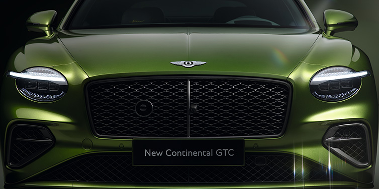 Bentley Leicester Bentley Continental GTC Speed convertible front bonnet detail in Tourmaline Green paint showing new light design