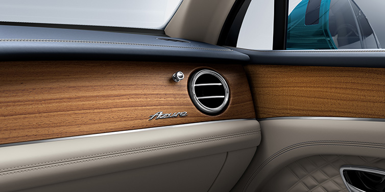 Bentley Leicester Bentley Bentayga Extended Wheelbase Azure front dash showing Open Pore Koa veneer surrounded by Portland and Imperial Blue hides