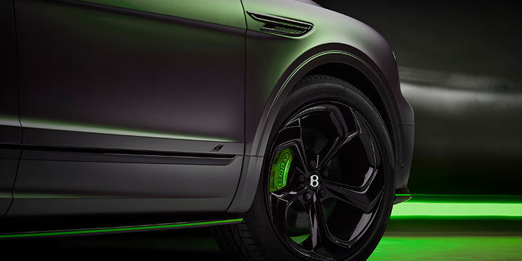 Bentley Leicester Bentley Bentayga S Black Edition SUV exterior wheel detail with Cyber Green brakes with Anthracite Satin paint